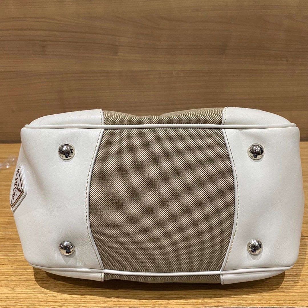 Prada Logo Jacquard (Category: Luxury Bags & Wallets) located in Quezon City. Submitted by yujin_1826 (Listing ID 1345772891, Image 3). Description: Prada Doctor’s bag - Authentic It is like the speedy bag of LV Pretty & Sturdy in actual. Clean & Spacious interior. Inclusions are Dustbag, Clochette,Keys, Authenticity card, booklet. Shipping c/o buyer or Meet-up in Eastwood City. .