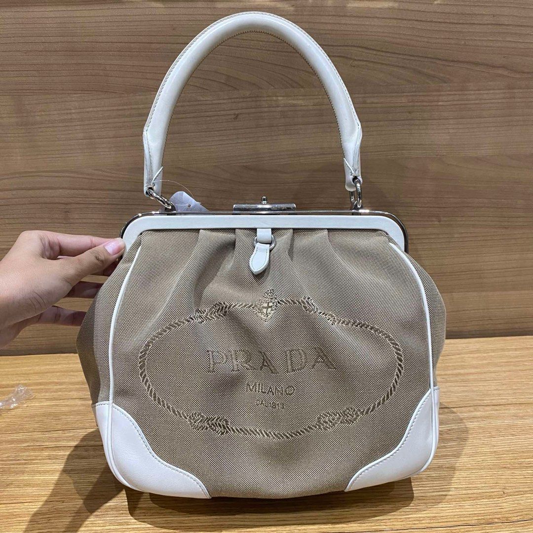 Prada Logo Jacquard (Category: Luxury Bags & Wallets) located in Quezon City. Submitted by yujin_1826 (Listing ID 1345772891, Image 1). Description: Prada Doctor’s bag - Authentic It is like the speedy bag of LV Pretty & Sturdy in actual. Clean & Spacious interior. Inclusions are Dustbag, Clochette,Keys, Authenticity card, booklet. Shipping c/o buyer or Meet-up in Eastwood City. .