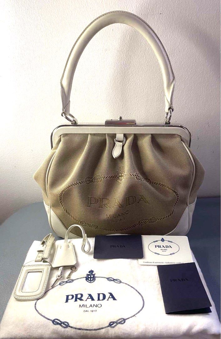 Prada Logo Jacquard (Category: Luxury Bags & Wallets) located in Quezon City. Submitted by yujin_1826 (Listing ID 1345772891, Image 2). Description: Prada Doctor’s bag - Authentic It is like the speedy bag of LV Pretty & Sturdy in actual. Clean & Spacious interior. Inclusions are Dustbag, Clochette,Keys, Authenticity card, booklet. Shipping c/o buyer or Meet-up in Eastwood City. .