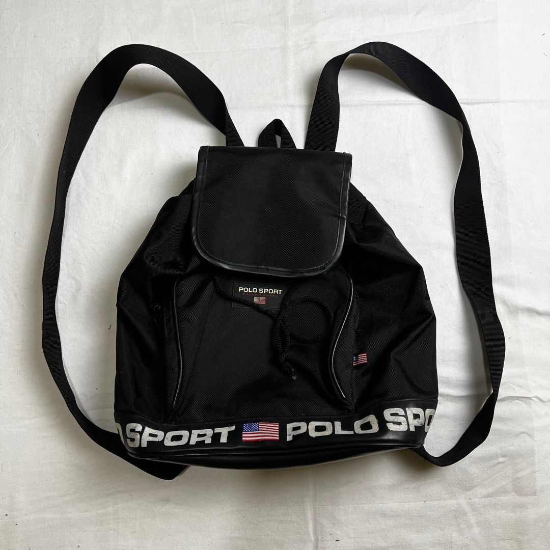 Ralph Lauren Polo Sport Drawstring Backpack in Black (Category: Backpacks) located in Caloocan City. Submitted by norte.mnl (Listing ID 1345836825, Image 2). Description: Ralph Lauren Polo Sport Drawstring Backpack in Black Size: 14in H x 14in L x 4in D Condition: Pristine. Hairline print cracks 𝘼𝙆𝙄𝙉: 1500.