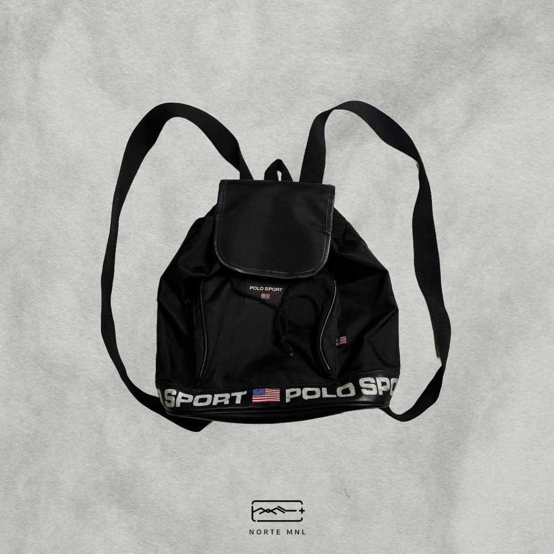 Ralph Lauren Polo Sport Drawstring Backpack in Black (Category: Backpacks) located in Caloocan City. Submitted by norte.mnl (Listing ID 1345836825, Image 1). Description: Ralph Lauren Polo Sport Drawstring Backpack in Black Size: 14in H x 14in L x 4in D Condition: Pristine. Hairline print cracks 𝘼𝙆𝙄𝙉: 1500.
