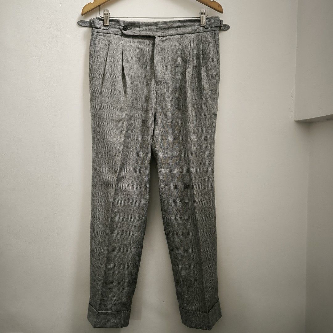 Tailored Plaid Grey Pleated Trousers (Category: Trousers) located in Quezon City. Submitted by slram (Listing ID 1345774216, Image 1). Description: 🤝 FOR SALE 🤝 🔵 Tailored Plaid Grey Pleated Trousers - Size: 34 - Color: Grey White pattern - Condition: Good - Issue: Missing buttons sa left back pocket - Waist: 34, Thigh: 11, Length: 38, Leg Opening: 8 ₱1,200 plus sf LOC: QC MOP: Gcash, Paymaya.