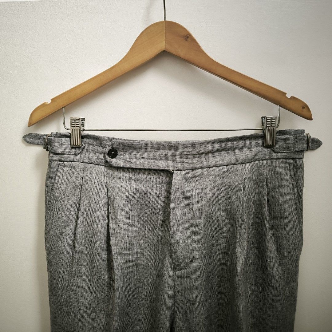 Tailored Plaid Grey Pleated Trousers (Category: Trousers) located in Quezon City. Submitted by slram (Listing ID 1345774216, Image 2). Description: 🤝 FOR SALE 🤝 🔵 Tailored Plaid Grey Pleated Trousers - Size: 34 - Color: Grey White pattern - Condition: Good - Issue: Missing buttons sa left back pocket - Waist: 34, Thigh: 11, Length: 38, Leg Opening: 8 ₱1,200 plus sf LOC: QC MOP: Gcash, Paymaya.