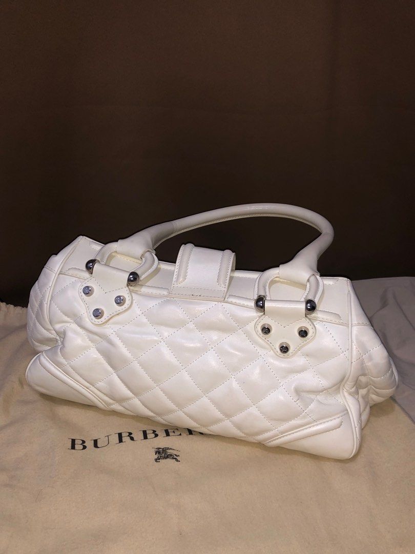 BURBERRY Quilted Leather Calfskin (Category: Luxury Bags & Wallets) located in Pasig City. Submitted by frankiscleaning (Listing ID 1346055074, Image 3). Description: Burberry Matgomery Bag Quilted Leather Calfskin LARGE Manor Bag Tote Purse OFF WHITE Padlock Color: 9/10 Even though it’s white and vintage, this bag has been well taken care of. The strap, color, and overall condition are perfect. It is now considered a luxury vintage item. This is