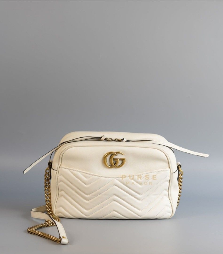 Gucci GG Marmont Off White Matelasse Camera Medium Bag (Category: Luxury Bags & Wallets) located in Taguig. Submitted by pursemaison (Listing ID 1346028477, Image 1). Description: Gucci GG Marmont Off White Matelasse Camera Medium Bag ✨Php 38,000 *Additional 4% for straight credit card payments *Available for 3 months layaway with 1% interest per month *BDO credit card up to 36 mos & Citibank credit card up to 24 mos (with interest) CONDITION: Fa