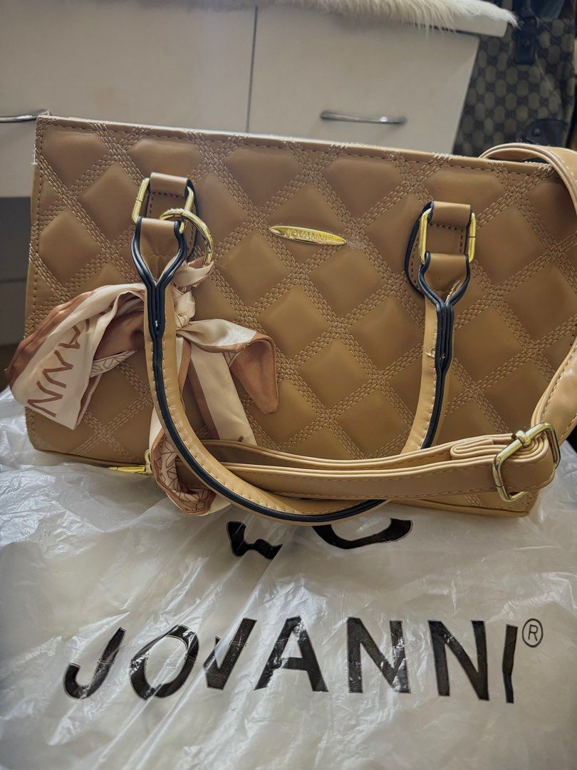 JOVANNI BAG (Category: Luxury Bags & Wallets) located in Manila. Submitted by yakult07 (Listing ID 1346024122, Image 1). Description: -BRANDNEW KAKABILI LANG SA MALL -MEDIUM SIZE BAG -sling/hand bag .