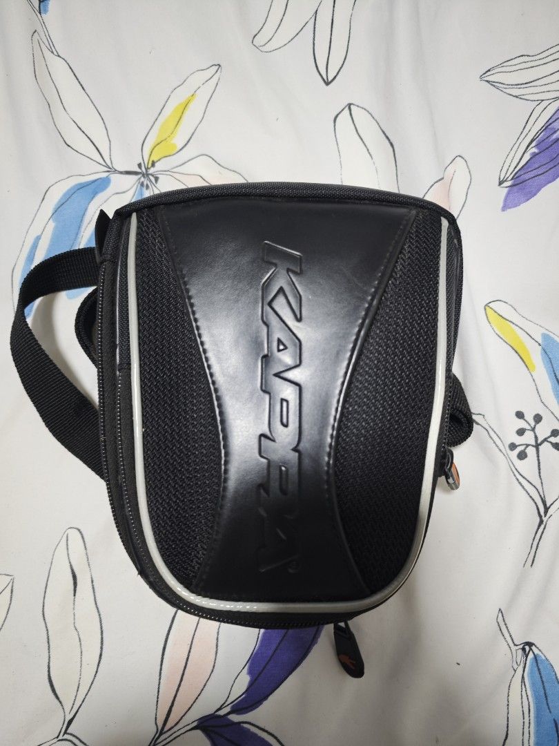 KAPPA RA307R Motorcycle Bicycle Cycling Travel Touring Small Leg Bag (Category: Motorcycle Apparel) located in Singapore. Submitted by knightstemplar (Listing ID 1345991281, Image 3). Description: Description: The Kappa RA307R is a very practical small bag which can be attached to the leg to contain the indispensable objects you need without being cumbersome during the ride. It is not only practical but durable being made from 840D Polyester plus