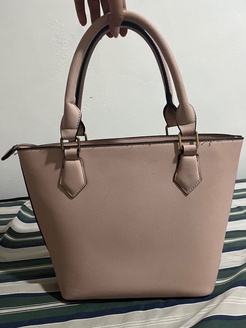 Pink Aldo Occimiano Tote Bag (Category: Tote Bags) located in Imus. Submitted by declutterbycad (Listing ID 1345966097, Image 2). Description: With minor flaws on handle and hardware With sling Still in good condition.