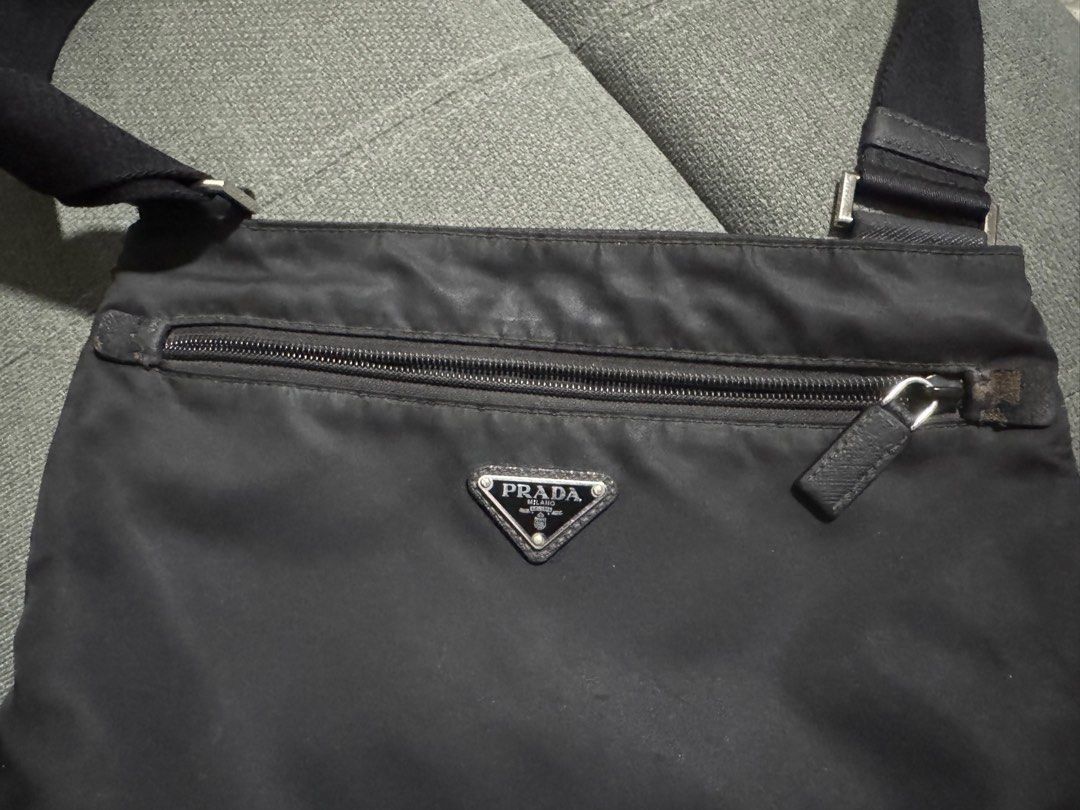 Prada Messenger Bag (Category: Luxury Bags & Wallets) located in Pasig City. Submitted by tsaris08 (Listing ID 1346012391, Image 2). Description: Prada Black Nylon Bag Guaranteed Authentic 7/10 RFS: Upgrading Meet up or Pick up in Pasig.