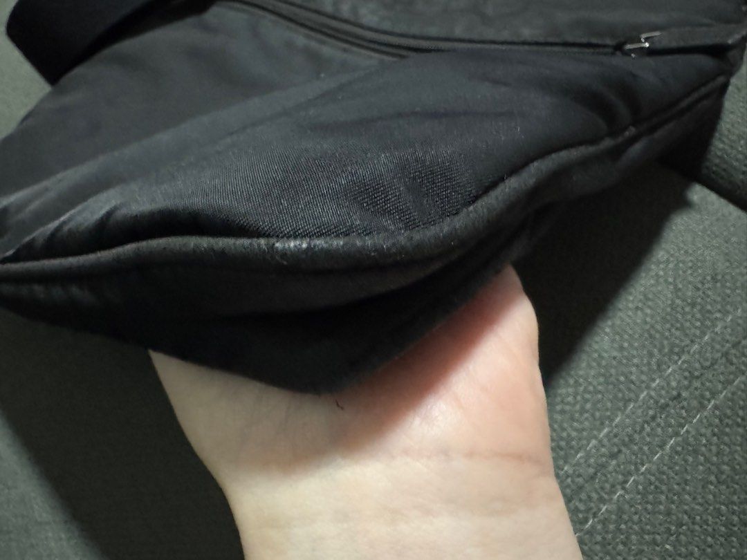 Prada Messenger Bag (Category: Luxury Bags & Wallets) located in Pasig City. Submitted by tsaris08 (Listing ID 1346012391, Image 3). Description: Prada Black Nylon Bag Guaranteed Authentic 7/10 RFS: Upgrading Meet up or Pick up in Pasig.