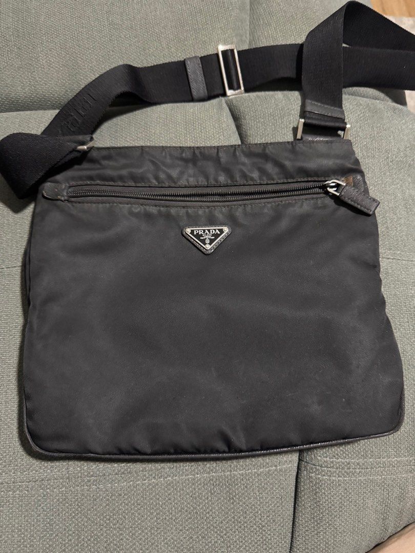 Prada Messenger Bag (Category: Luxury Bags & Wallets) located in Pasig City. Submitted by tsaris08 (Listing ID 1346012391, Image 1). Description: Prada Black Nylon Bag Guaranteed Authentic 7/10 RFS: Upgrading Meet up or Pick up in Pasig.