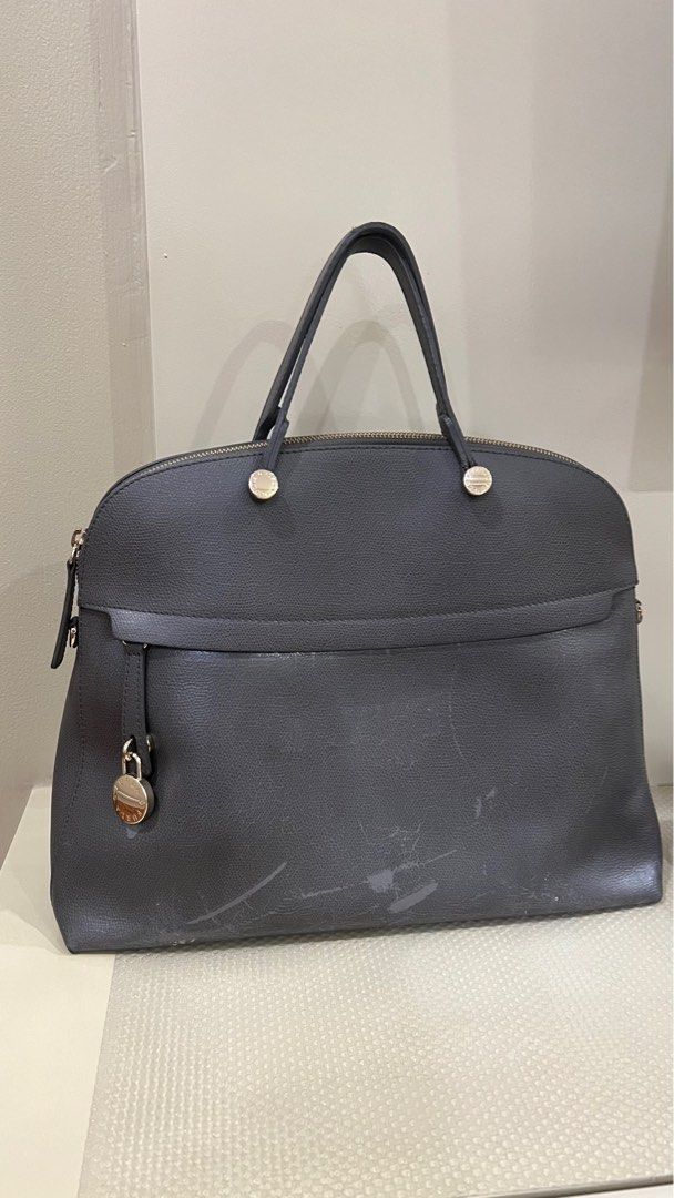 Preloved, with issues: Furla hand carry bag (Category: Luxury Bags & Wallets) located in Manila. Submitted by irockmysocks_ogee (Listing ID 1345921548, Image 1). Description: .