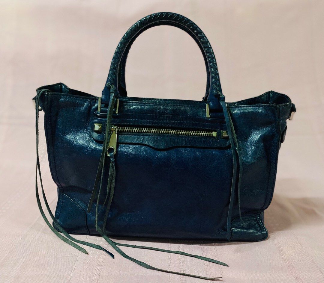 Rebecca Minkoff Regan Two Way Satchel Bag in Blue (Category: Cross-body Bags) located in Santa Maria. Submitted by enpmimmi (Listing ID 1345992194, Image 1). Description: 💯% Authentic Rebecca Minkoff Regan Two Way Satchel Blue leather Double handles Detachable adjustable crossbody strap Zip closure, lined Lightly used Normal signs of use Dimensions: (approximate) Width - 13.25 inches Height - 9.5 inches Depth - 5 inches Handle drop- 5 inches Str