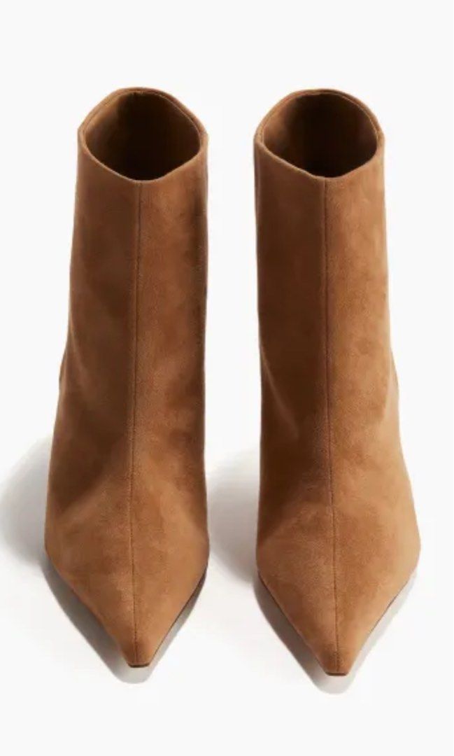 Super Sale!! Brandnew H&M Brown Suede Heeled Boots (Category: Boots) located in Angeles City. Submitted by fabgrabs831 (Listing ID 1345990232, Image 2). Description: Super Sale!! H&M Suede Heeled Boots From Japan Super nice and classy when worn! Color: Camel Sizes: 40 .