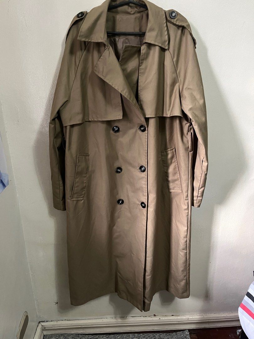Trench Coat Korean (Category: Coats, Jackets and Outerwear) located in Valenzuela. Submitted by cheerios09 (Listing ID 1345975512, Image 3). Description: Bought in Korea 2023, tag removed Heavy, lined trench coat Good for size large-xl Bdo/gcash Shipping starts at 80 via ggx metro manila.