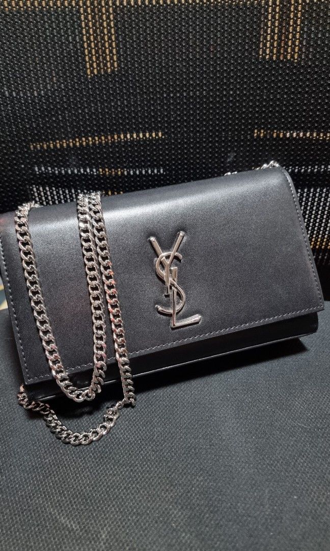 YSL kate Bag Medium (Category: Luxury Bags & Wallets) located in Cavite. Submitted by awesome0022 (Listing ID 1345980864, Image 1). Description: YSL Kate Bag in Cow Leather Medium Size soft cow leather structured bag in silver heavy chain hardwares gamusa inside. comes with generic dustbag only. Once purchased, no returns, no exchange and no refunds. Delivery via lalamove or lbc.