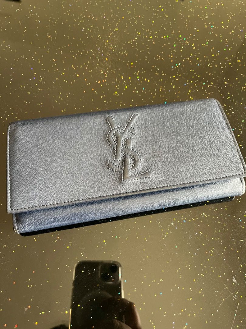 YSL vintage wallet (Category: Luxury Bags & Wallets) located in Caloocan City. Submitted by goldentreeph (Listing ID 1345966074, Image 1). Description: brand: YSL material: lambskin style: long wallet color: Naby blue multiple card slots middle coin slot with 2 bill compartments as is no box but still in good condition .