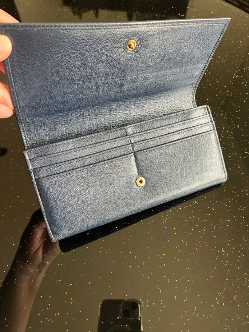 YSL vintage wallet (Category: Luxury Bags & Wallets) located in Caloocan City. Submitted by goldentreeph (Listing ID 1345966074, Image 2). Description: brand: YSL material: lambskin style: long wallet color: Naby blue multiple card slots middle coin slot with 2 bill compartments as is no box but still in good condition .