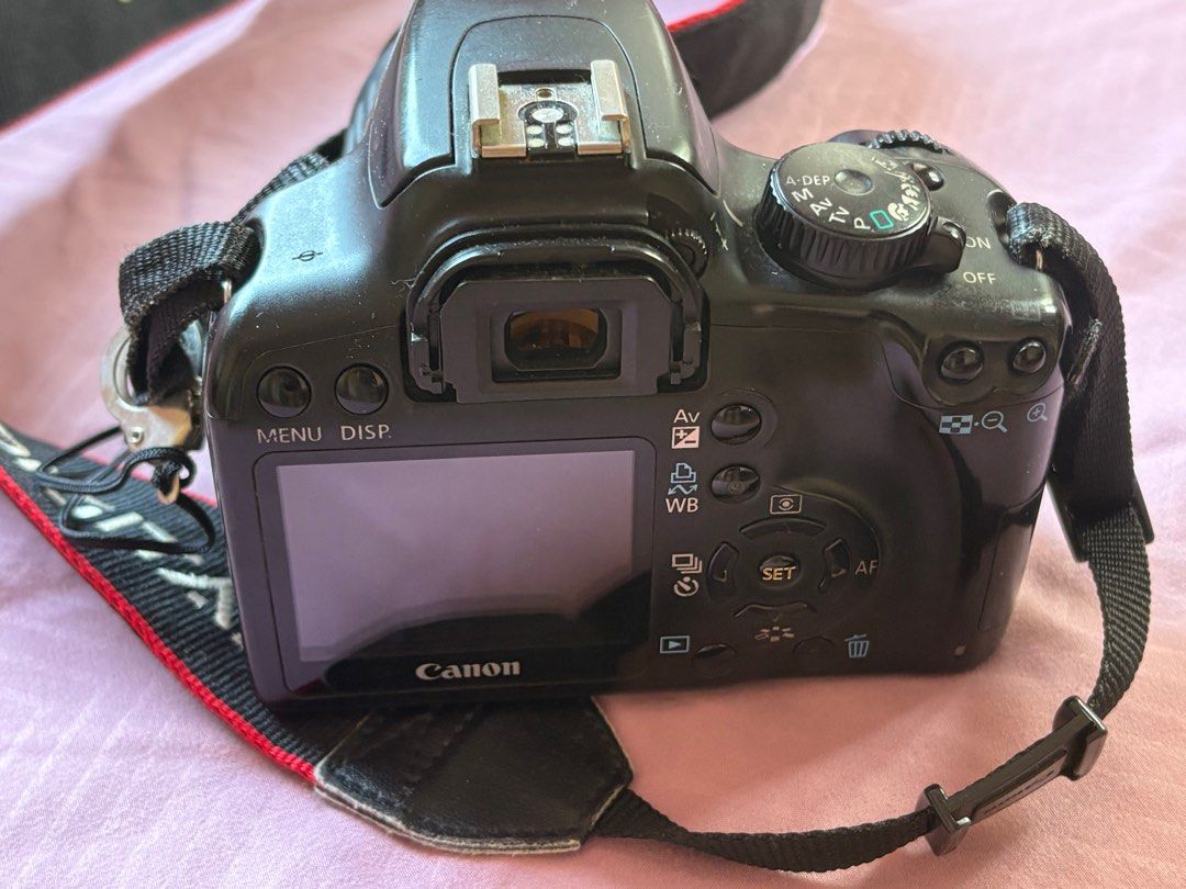 Canon 1000D (Category: Cameras) located in Las Pinas. Submitted by livingroomfloor (Listing ID 1346144354, Image 3). Description: Price is nego Comes with 18-55mm lens, battery, and charger No issue.