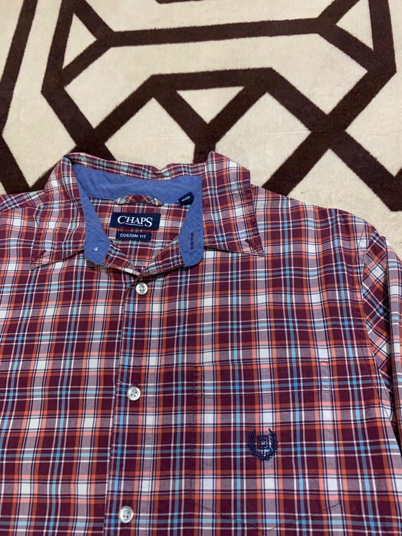 CHAPS PLAID BUTTON DOWN POLO LONG SLEEVES (Category: Formal Shirts) located in Calumpit. Submitted by sidethrift25 (Listing ID 1346276847, Image 2). Description: WIDTH-22.5 LENGTH-29.5 MEDIUM ON TAG CUSTOM FIT EXCELLENT CONDITION NO FLAWS.