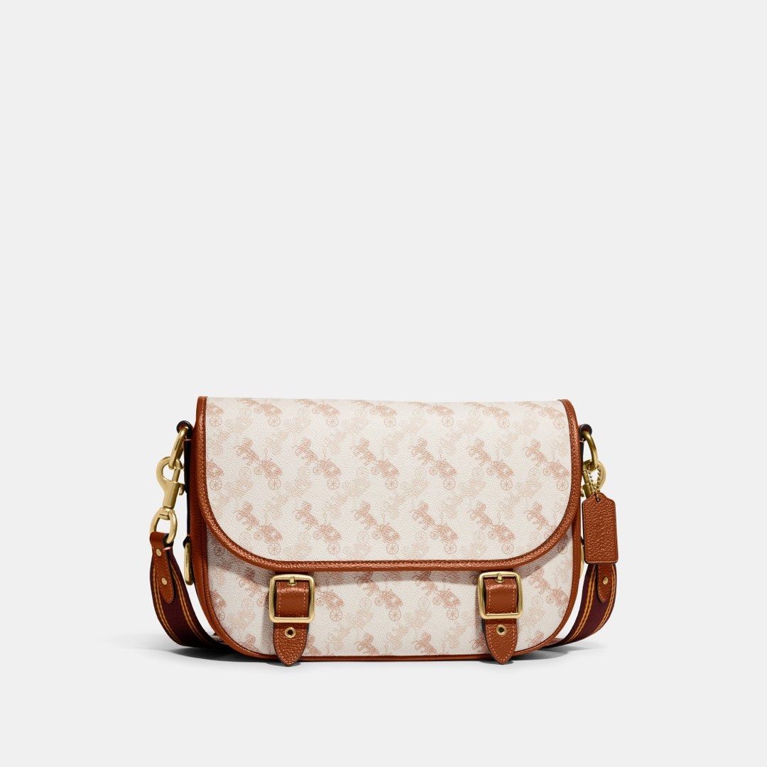 Original Coach bag (Field Messenger Bag With Horse And Carriage Print) (Category: Bags & Wallets) located in Singapore. Submitted by stacy444dance (Listing ID 1346129765, Image 1). Description: Printed coated canvas and polished pebble leather Inside zip and multifunction pockets Magnetic snap closure and fabric lining Outside snap pocket Detachable strap with 54.5cm drop for shoulder or crossbody wear 28.5cm (L) x 20cm (H) x 8cm (W).