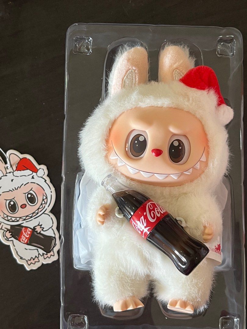 Labubu coca cola series - Surprise Shake (Category: Designer & Blind Box Toys) located in Paranaque City. Submitted by xysabelle (Listing ID 1346143009, Image 2). Description: UNSEALED BOX, NEVER USED ‼️ SRP Price na yan No sparks :< I realized I just liked the v1 and v2 versions bought from Tiktokshop Popmart. Will send receipt from tiktok if needed. THIS IS AUTHENTIC. ‼️ .
