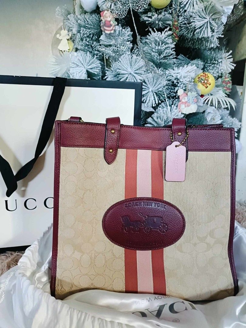 Orig Brandnew Coach and Givenchy items (Category: Luxury Bags & Wallets) located in Taguig. Submitted by emz0923 (Listing ID 1346141787, Image 2). Description: Take all!!!! 1. Brandnew Coach field tote (comes in gucci paper bag, dustbag, carecard and tags 2. Brandnew Coach file crossbody bag, with carecard and tag only ( no paper bag and dustbag) 3. Brandnew Givenchy 7122/S series sunglasses, complete inclusion except paper bag 4. Coach minna moc