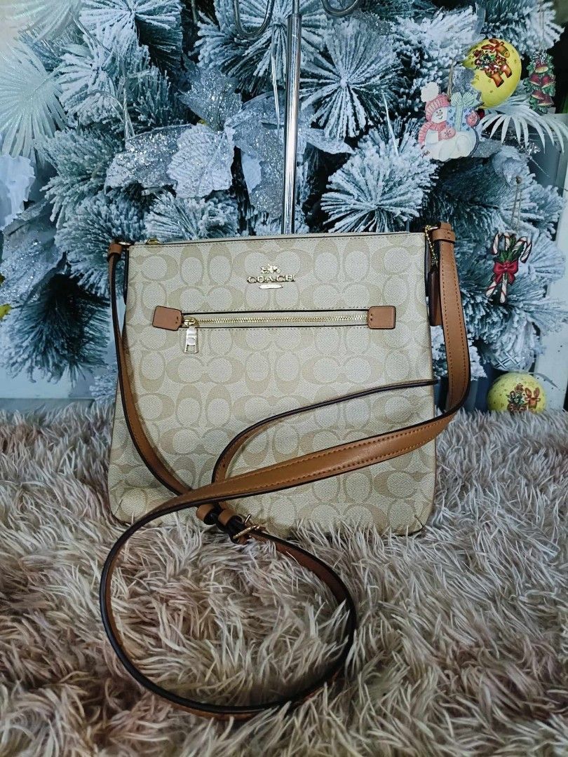 Orig Brandnew Coach and Givenchy items (Category: Luxury Bags & Wallets) located in Taguig. Submitted by emz0923 (Listing ID 1346141787, Image 3). Description: Take all!!!! 1. Brandnew Coach field tote (comes in gucci paper bag, dustbag, carecard and tags 2. Brandnew Coach file crossbody bag, with carecard and tag only ( no paper bag and dustbag) 3. Brandnew Givenchy 7122/S series sunglasses, complete inclusion except paper bag 4. Coach minna moc