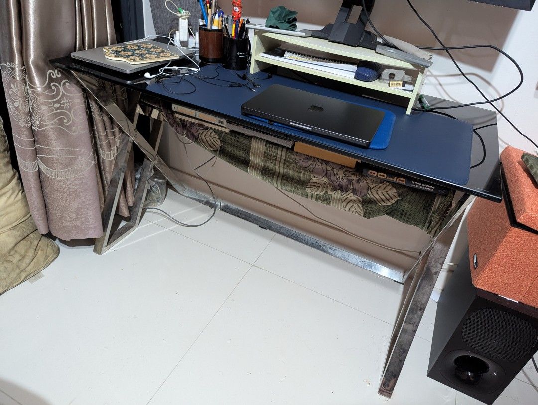 Work table (Category: Tables & Sets) located in Singapore. Submitted by freetree.172ee5 (Listing ID 1346238096, Image 2). Description: Made of tempered glass and steel at the bottom, this table is very study and looks classy. Refer to 3rd photo for slight paint peeling off at the bottom of the glass. L: 116 W: 58 Self pick up and manage your own delivery.