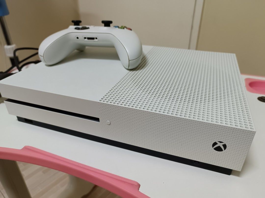 Xbox One S Slim Type (Category: Xbox) located in Manila. Submitted by chinlabrador93555 (Listing ID 1346222146, Image 1). Description: RUSH SALE ✨ Selling my XBOX ONE S slim type, no issues, plug & play, ready to use, with wireless controller, downloaded games (can store up to 500 online downloadable games, use your own account), and with cable & power plug, seldom used since we have Nintendo switch, for pick up thru lalamove or LBC transaction o
