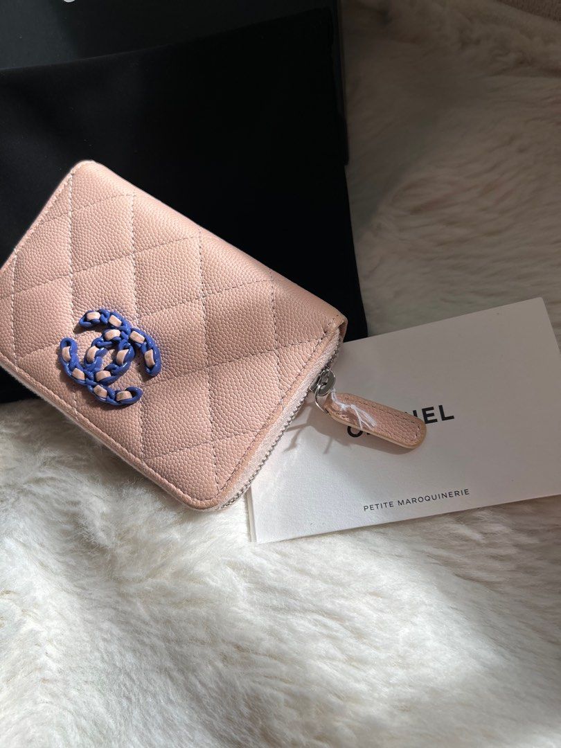 Almost new Chanel Compact Zipped wallet Pink (Category: Luxury Bags & Wallets) located in Pasay City. Submitted by georgiaetc (Listing ID 1346379976, Image 2). Description: Almost new Chanel Compact Zipped Wallet Pink & Purple Combi Caviar leather With box , dustbag and care card Microchip .