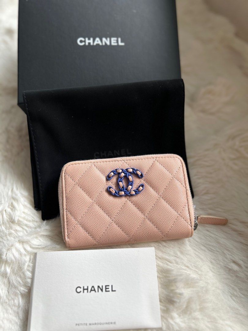 Almost new Chanel Compact Zipped wallet Pink (Category: Luxury Bags & Wallets) located in Pasay City. Submitted by georgiaetc (Listing ID 1346379976, Image 1). Description: Almost new Chanel Compact Zipped Wallet Pink & Purple Combi Caviar leather With box , dustbag and care card Microchip .
