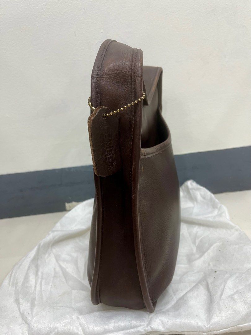 Coach Ergo 9047 (Category: Luxury Bags & Wallets) located in Pasig City. Submitted by zen_it_all (Listing ID 1346415383, Image 3). Description: coach ergo 9047 soft and buttery with light brown spots in-front and some dents in the back but it does not affect the beauty of the bag with hangtag (split tag) price plus + sf .