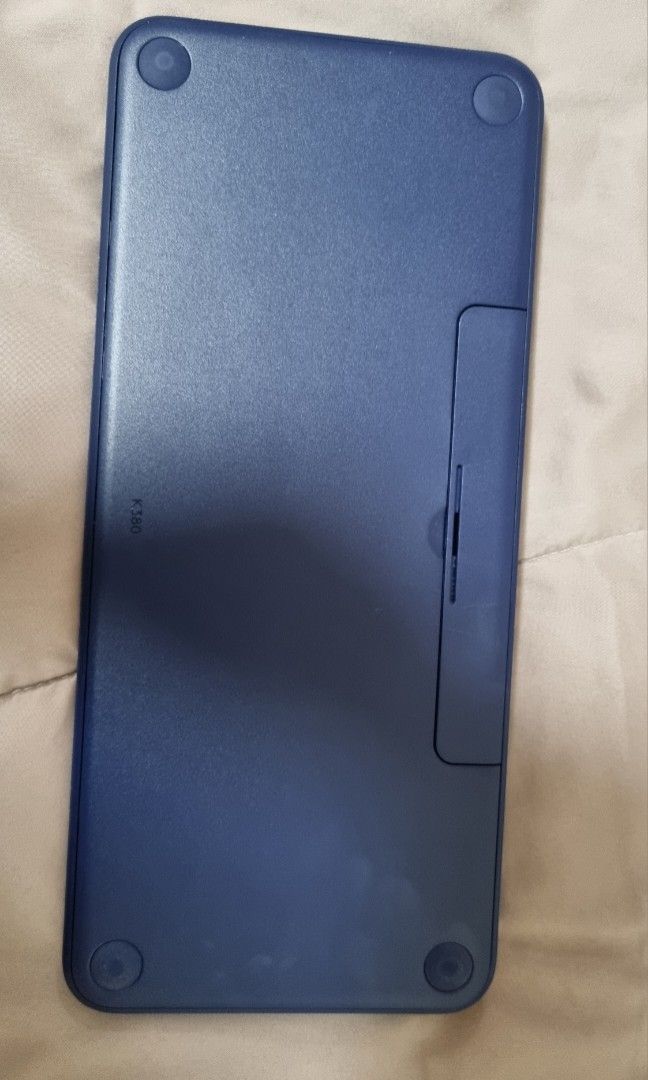 Logitech K380 Multi-Device Bluetooth Keyboard (Blue) (Category: Computer Keyboard) located in Quezon City. Submitted by inascloset (Listing ID 1346303168, Image 3). Description: WITH BOX. Selling at L@zada for ₱1,200+ Note: refer to pic for condition. • Wireless Bluetooth 3.0 Connectivity • Connect up to 3 Devices Simultaneously • Built-In Hotkeys • Powered by 2 x AAA Batteries • Battery & Bluetooth Indicator Lights • Compatible with Multiple Pla