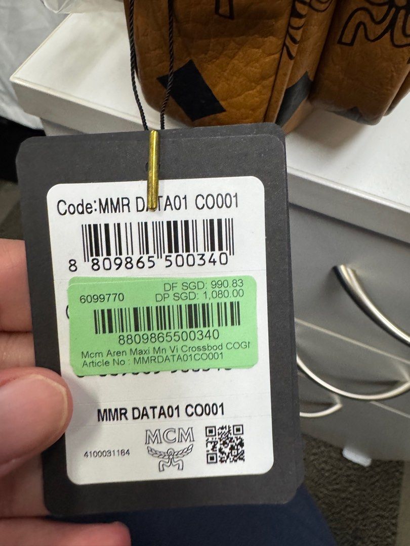 MCM - Aren Maxi Crossbody Bag (6099770) (Category: Bags & Wallets) located in Singapore. Submitted by ng.x.hui.7 (Listing ID 1346395621, Image 3). Description: Brand new with dust bag and tags. Receipt in photo form as I purchased quite a few item. 100% authentic if not full refund. Legit check ok at my block only! Retails for $990 (exclude tax). If listing is active means is available. No need ask on availability. Low baller and time wasters ple