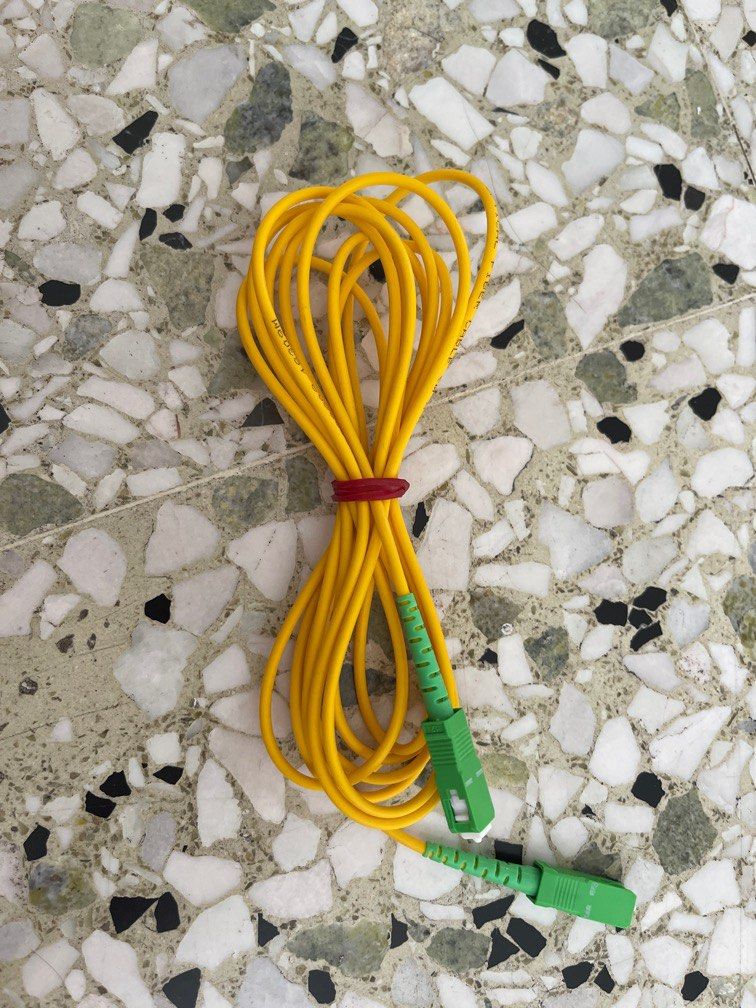 Optic cable (Category: Networking) located in Singapore. Submitted by TohLeng (Listing ID 1346330397, Image 1). Description: As in photo.. Ard 2m long.