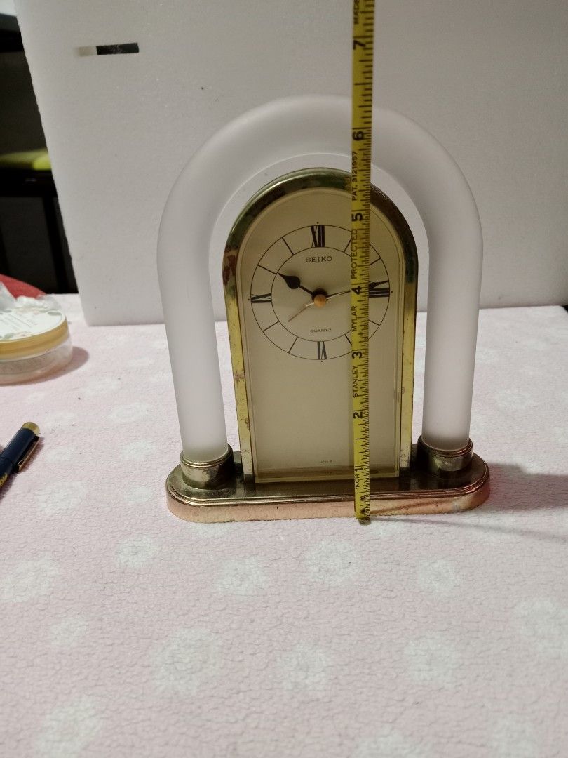 Vintage SEIKO table clock (Category: Clocks) located in Tabaco. Submitted by fritznicoleshoppe (Listing ID 1346381950, Image 2). Description: vintage / rare SEIKO clock. made of glass and metal. Works on one AA battery (with one battery FREE) * initial test-alarm does not work * battery slot no cover Otherwise this is a beautiful vintage clock.