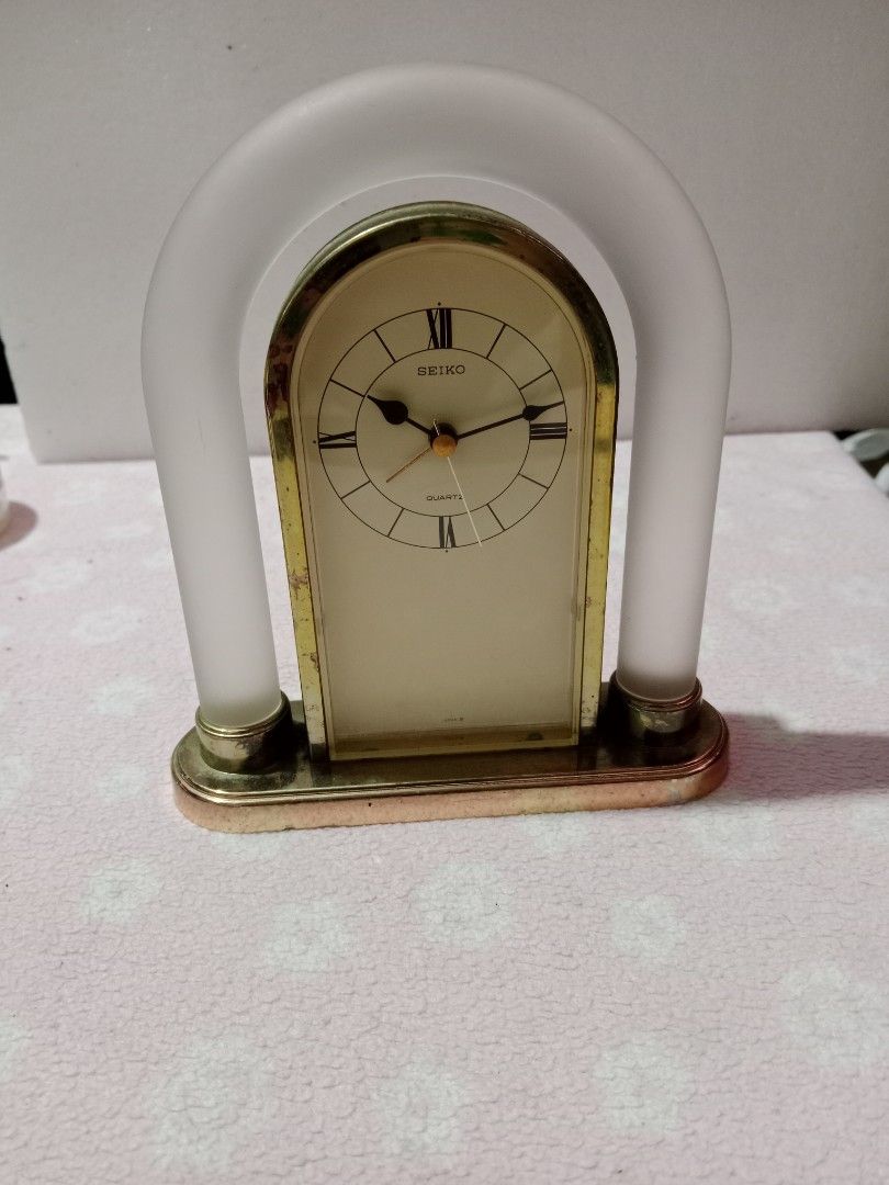 Vintage SEIKO table clock (Category: Clocks) located in Tabaco. Submitted by fritznicoleshoppe (Listing ID 1346381950, Image 1). Description: vintage / rare SEIKO clock. made of glass and metal. Works on one AA battery (with one battery FREE) * initial test-alarm does not work * battery slot no cover Otherwise this is a beautiful vintage clock.