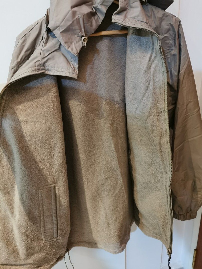 Winter Jacket Windproof (Category: Coats, Jackets and Outerwear) located in Singapore. Submitted by xlcrap2210 (Listing ID 1346475950, Image 2). Description: ptp 20 inch estimate size M. good for 165 - 170cm person with 2 layers inner wear. inner and outer pockets. hood detachable. defect: the pullstrings are worn out (see last pic).