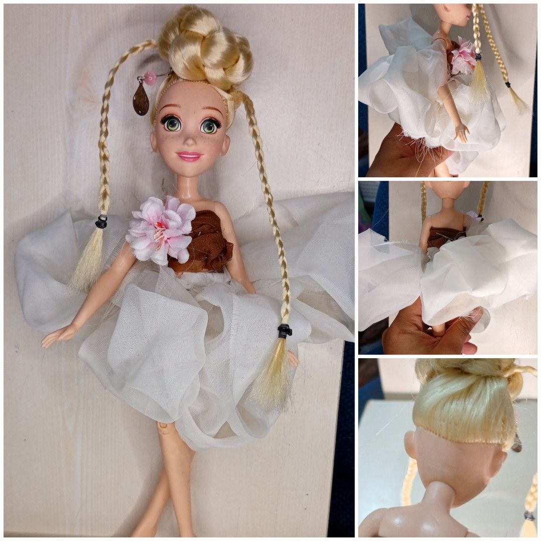 29cm rapunzel barbie doll toy (Category: Kids Toys) located in Echague. Submitted by manikaisabelavarietyshop (Listing ID 1395739557, Image 1). Description: 29cm rapunzel barbie doll toy.