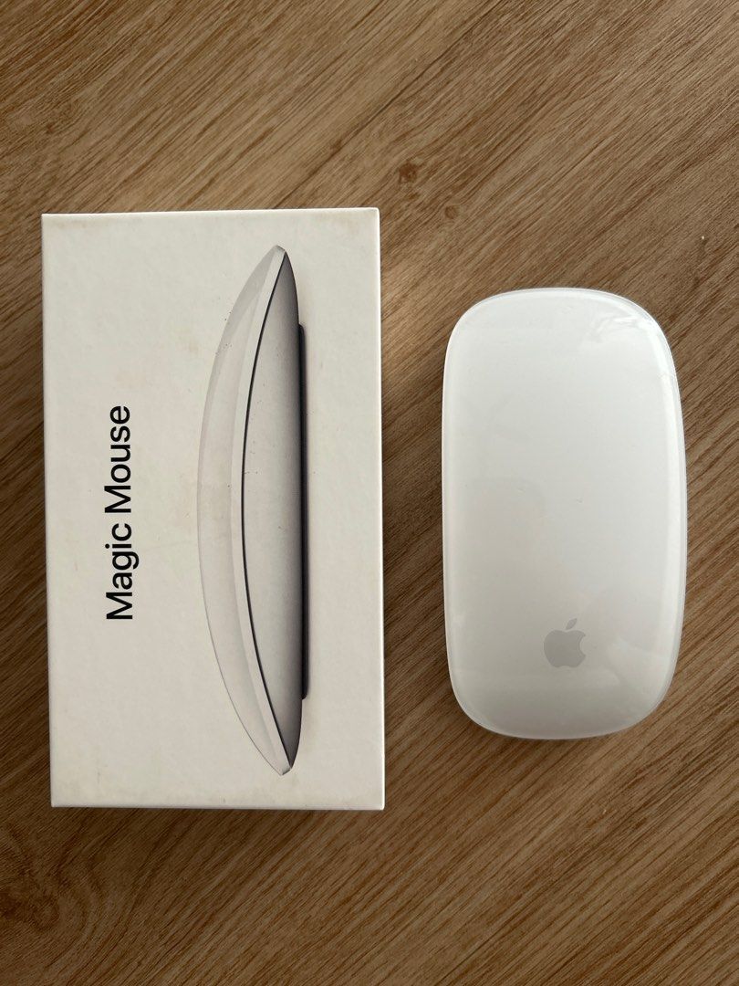 Apple Magic Mouse (Category: Mouse & Mousepads) located in Singapore. Submitted by lion1935 (Listing ID 1395736282, Image 2). Description: - Includes original box - Fully functional - Ready to use - Ideal for Mac setup.