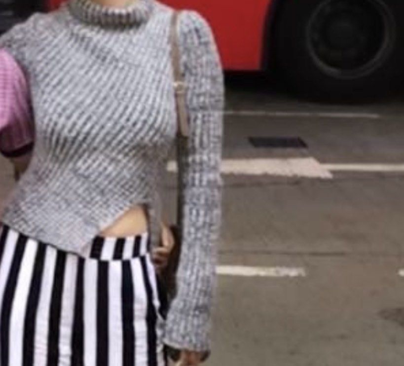 Asymmetrical Turtleneck Sweater cardigan (Category: Coats, Jackets and Outerwear) located in Las Pinas. Submitted by bluesy3 (Listing ID 1395912425, Image 3). Description: - Asymmetrical design - Turtleneck - Long sleeves - Ribbed texture - Gray and white color - Stylish and versatile.