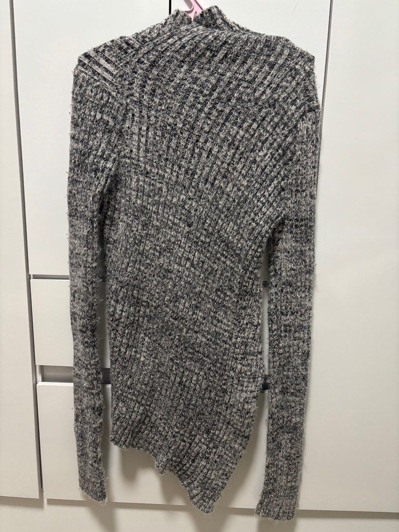 Asymmetrical Turtleneck Sweater cardigan (Category: Coats, Jackets and Outerwear) located in Las Pinas. Submitted by bluesy3 (Listing ID 1395912425, Image 2). Description: - Asymmetrical design - Turtleneck - Long sleeves - Ribbed texture - Gray and white color - Stylish and versatile.