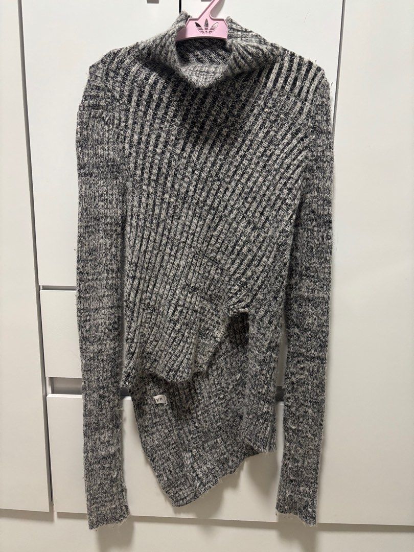 Asymmetrical Turtleneck Sweater cardigan (Category: Coats, Jackets and Outerwear) located in Las Pinas. Submitted by bluesy3 (Listing ID 1395912425, Image 1). Description: - Asymmetrical design - Turtleneck - Long sleeves - Ribbed texture - Gray and white color - Stylish and versatile.