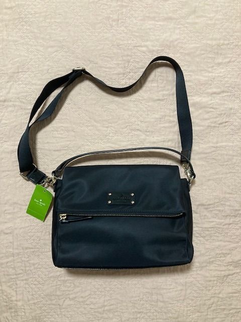Authentic Kate Spade Mini Maria Crossbody Bag (Category: Cross-body Bags) located in Paranaque City. Submitted by vanitelab (Listing ID 1395668793, Image 1). Description: Authentic and Brand-new KATE SPADE MINI MARIA includes care card Product Description: Material: Nylon, Polyvinyl, Polyester Opening: Top-snap and zip closure Color: Black Interior: multi-function pocket Size: 10 x 7 x 3.5 inches Strap: Adjustable and detachable crossbody strap I