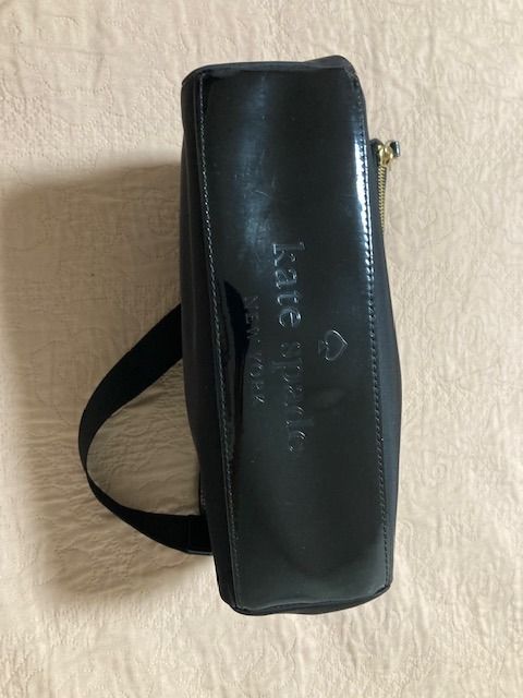 Authentic Kate Spade Mini Maria Crossbody Bag (Category: Cross-body Bags) located in Paranaque City. Submitted by vanitelab (Listing ID 1395668793, Image 3). Description: Authentic and Brand-new KATE SPADE MINI MARIA includes care card Product Description: Material: Nylon, Polyvinyl, Polyester Opening: Top-snap and zip closure Color: Black Interior: multi-function pocket Size: 10 x 7 x 3.5 inches Strap: Adjustable and detachable crossbody strap I