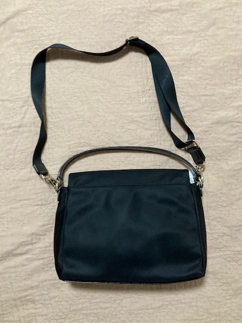 Authentic Kate Spade Mini Maria Crossbody Bag (Category: Cross-body Bags) located in Paranaque City. Submitted by vanitelab (Listing ID 1395668793, Image 2). Description: Authentic and Brand-new KATE SPADE MINI MARIA includes care card Product Description: Material: Nylon, Polyvinyl, Polyester Opening: Top-snap and zip closure Color: Black Interior: multi-function pocket Size: 10 x 7 x 3.5 inches Strap: Adjustable and detachable crossbody strap I