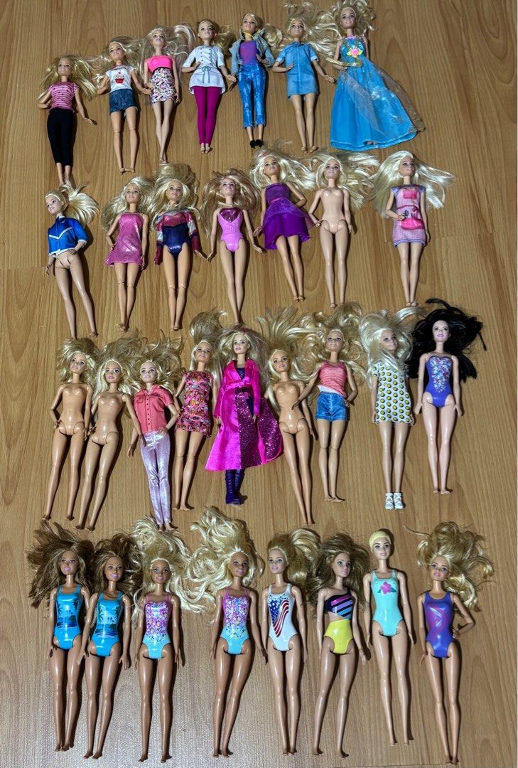 Barbie Disney Dolls (Category: Kids Toys) located in Manila. Submitted by shopnsavin (Listing ID 1395882916, Image 1). Description: - Assorted Barbie doll collection. - Features dolls with diverse outfits: swimsuits, dresses, and casual wear. - Includes mermaid and Disney-themed dolls. - Dolls have different skin tones and hair colors. - Please note: Some dolls may be missing clothing. SOLD na po ang iba Rare Barbie Fashionistas P1500 each Barbie