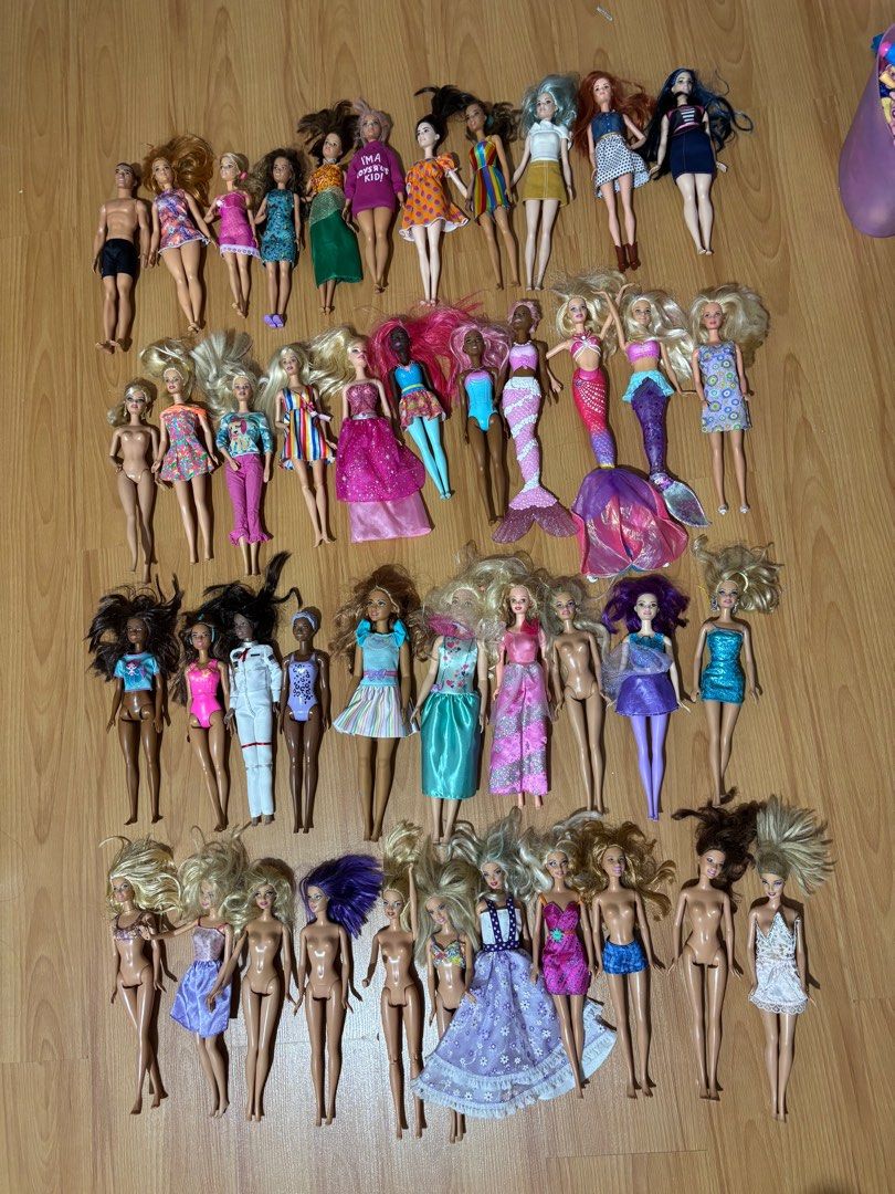 Barbie Disney Dolls (Category: Kids Toys) located in Manila. Submitted by shopnsavin (Listing ID 1395882916, Image 2). Description: - Assorted Barbie doll collection. - Features dolls with diverse outfits: swimsuits, dresses, and casual wear. - Includes mermaid and Disney-themed dolls. - Dolls have different skin tones and hair colors. - Please note: Some dolls may be missing clothing. SOLD na po ang iba Rare Barbie Fashionistas P1500 each Barbie