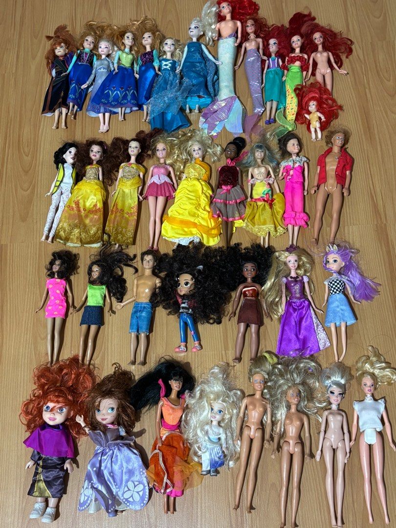 Barbie Disney Dolls (Category: Kids Toys) located in Manila. Submitted by shopnsavin (Listing ID 1395882916, Image 3). Description: - Assorted Barbie doll collection. - Features dolls with diverse outfits: swimsuits, dresses, and casual wear. - Includes mermaid and Disney-themed dolls. - Dolls have different skin tones and hair colors. - Please note: Some dolls may be missing clothing. SOLD na po ang iba Rare Barbie Fashionistas P1500 each Barbie